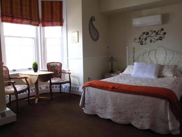 Garden South Park Inn : photo 2 de la chambre chambre lit queen-size