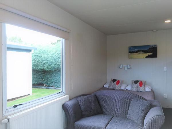 Taupo Debretts Spa Resort : photo 2 de la chambre chambre quadruple avec salle de bains commune