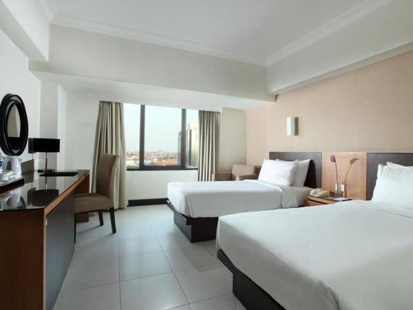 Hotel Santika Pandegiling - Surabaya : photo 4 de la chambre chambre lit king-size deluxe