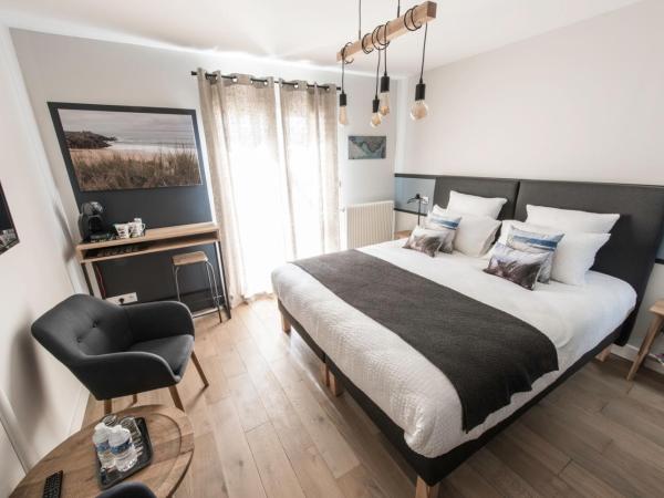 A l'Ombre des Pins : photo 4 de la chambre chambre lit king-size