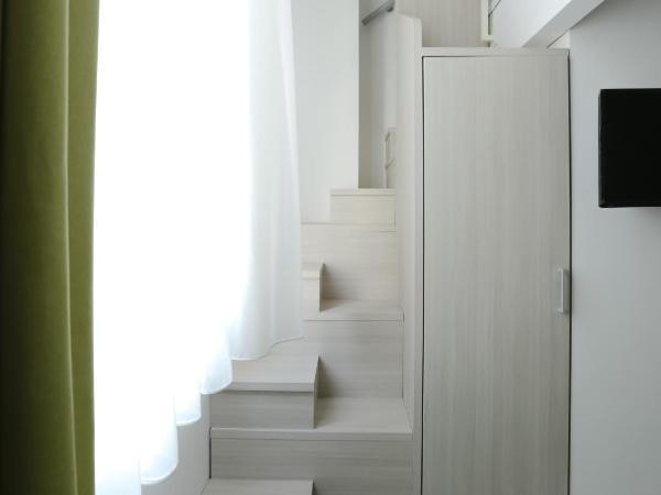 Ecumano Space : photo 6 de la chambre chambre double ou lits jumeaux Économique - en duplex