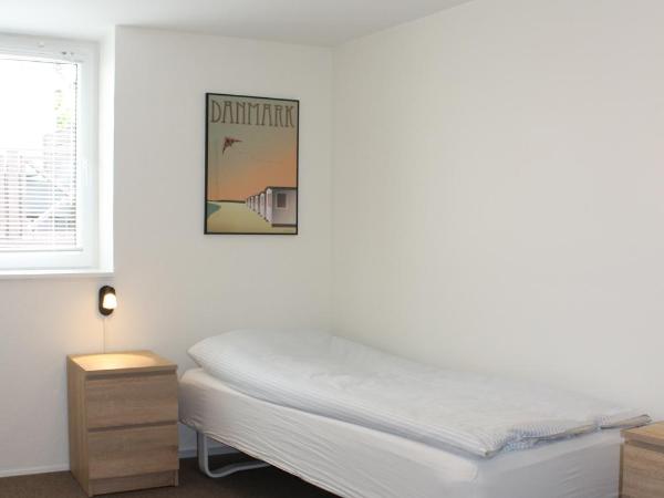 Amalie Bed and Breakfast & Apartments : photo 1 de la chambre chambre simple avec salle de bains commune