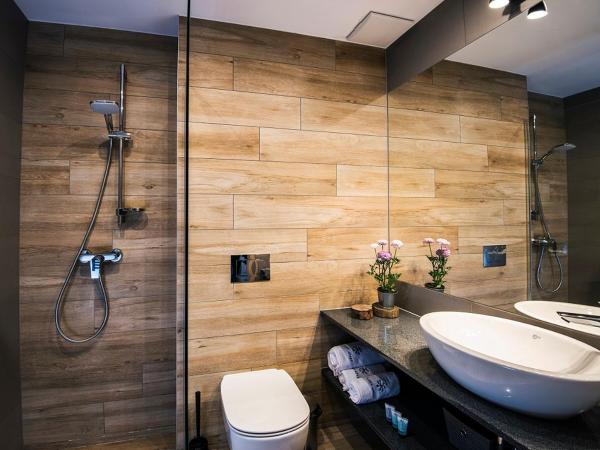 Apartamenty Forma Tatrica : photo 10 de la chambre appartement 1 chambre confort avec cheminée et balcon ou terrasse