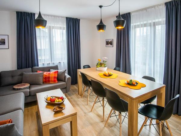 Apartamenty Forma Tatrica : photo 6 de la chambre appartement 2 chambres deluxe avec cheminée et balcon ou terrasse