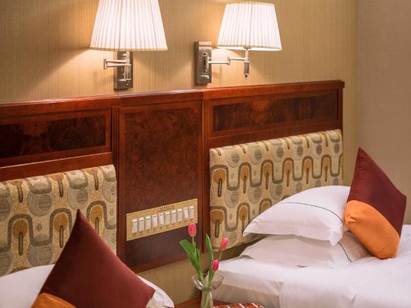 Asia International Hotel Guangdong : photo 4 de la chambre chambre lits jumeaux deluxe