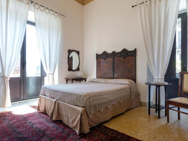 Alcalà Living B&B : photo 3 de la chambre chambre triple avec salle de bains