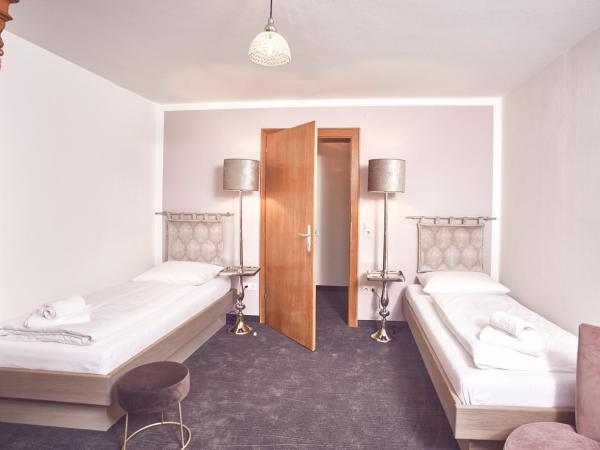 Boutique-Gasthof Ueberfuhr : photo 3 de la chambre chambre lits jumeaux