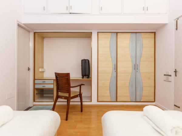 Locul Uptown - Near Bangalore Palace Grounds : photo 2 de la chambre standard doube room with shower