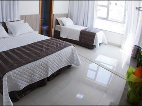 Hotel Conexão Pampulha : photo 1 de la chambre chambre lits jumeaux