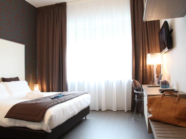 Hotel Tiziano - Gruppo Mini Hotel : photo 5 de la chambre chambre double - vue sur parc