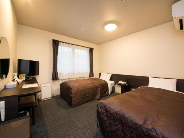 Osaka Moriguchi Plaza Hotel : photo 2 de la chambre chambre lits jumeaux - non-fumeurs