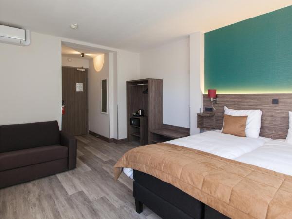 Best Western Hotel Den Haag : photo 9 de la chambre chambre lits jumeaux familiale