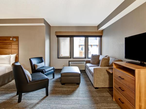 Canalta Lodge : photo 2 de la chambre hébergement lit king-size avec canapé-lit