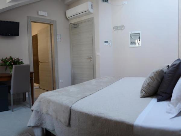 Hotel Giulio Cesare : photo 4 de la chambre chambre triple supérieure