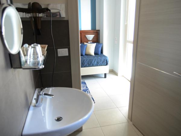 Hotel Giulio Cesare : photo 2 de la chambre chambre triple - accessible aux personnes à mobilité réduite