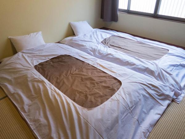 Guest House Hitsujian : photo 6 de la chambre chambre standard style japonais avec accès salle de bains commune - non-fumeurs