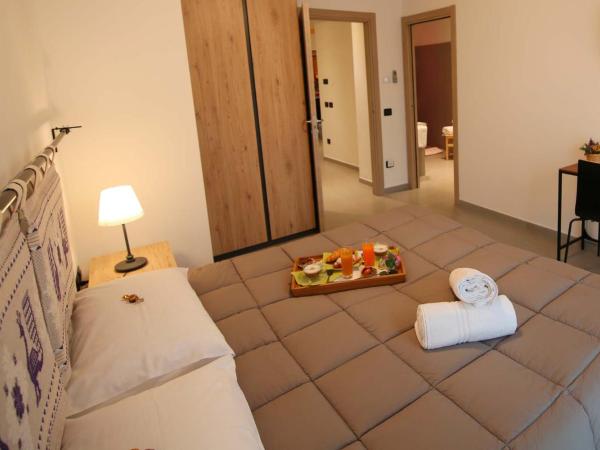 I Fiori di Margherita Luxury B&B : photo 8 de la chambre chambre double ou lits jumeaux supérieure avec vue sur ville