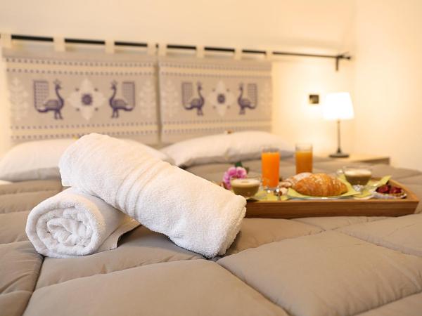 I Fiori di Margherita Luxury B&B : photo 6 de la chambre chambre double ou lits jumeaux supérieure avec vue sur ville