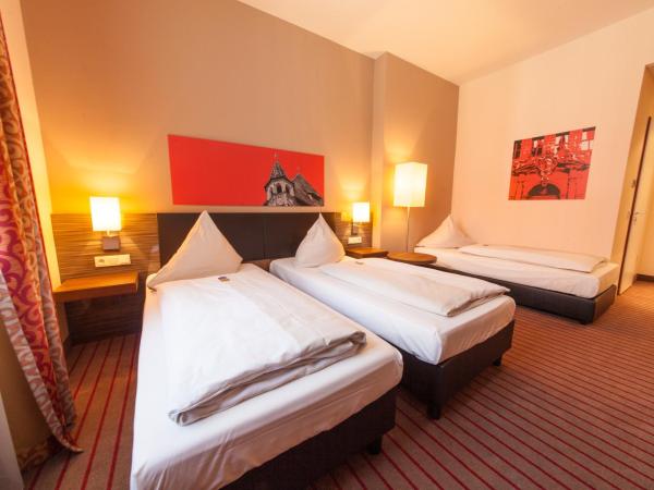 Novina Hotel Tillypark : photo 3 de la chambre chambre triple