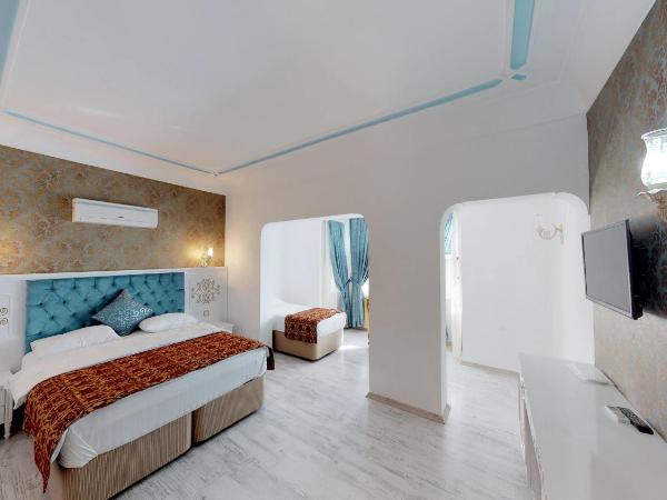 Urcu Hotel : photo 2 de la chambre chambre familiale - vue sur ville 