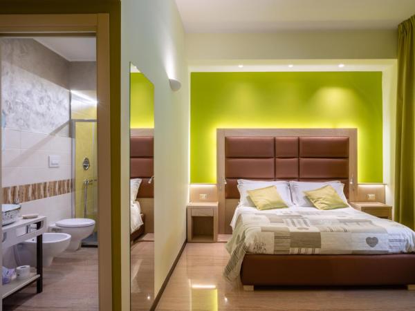 Villa Domus Salento Suites & Rooms con parcheggio privato in loco : photo 8 de la chambre chambre deluxe