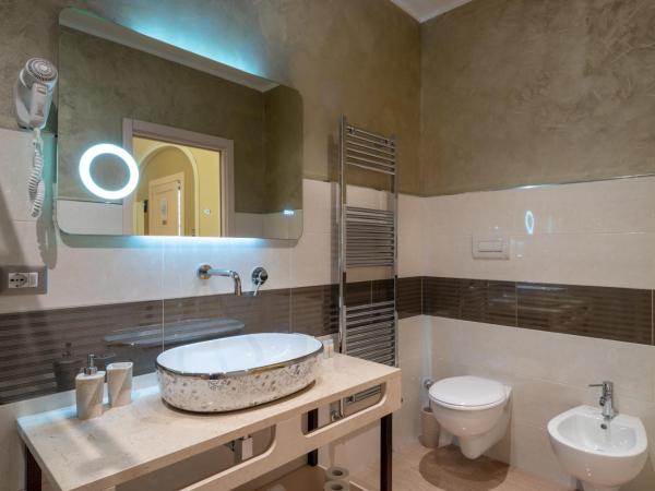 Villa Domus Salento Suites & Rooms con parcheggio privato in loco : photo 6 de la chambre suite deluxe avec baignoire spa