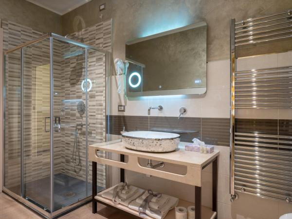 Villa Domus Salento Suites & Rooms con parcheggio privato in loco : photo 5 de la chambre suite deluxe avec baignoire spa