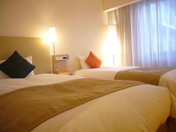 City Plaza Osaka : photo 2 de la chambre chambre simple avec lit d'appoint - non-fumeurs