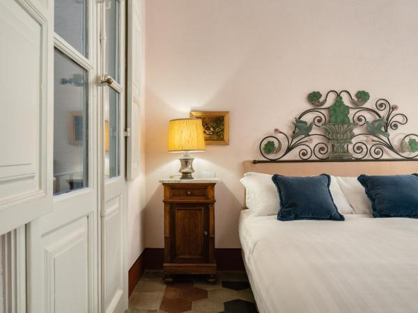 Bellezza Suites : photo 5 de la chambre chambre lit king-size standard