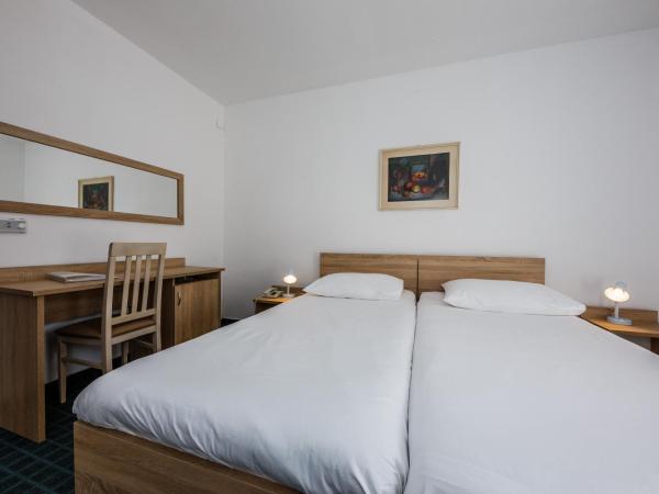 Hotel Medena Budget : photo 2 de la chambre chambre double ou lits jumeaux standard - vue sur jardin