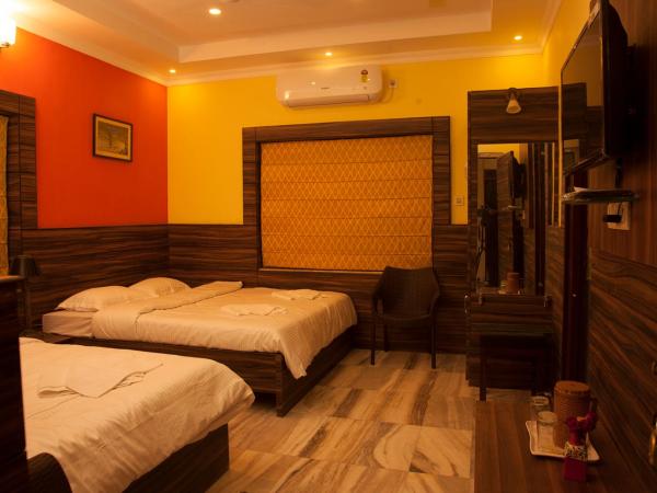 Om Sai Villa Guesthouse : photo 4 de la chambre chambre quadruple deluxe