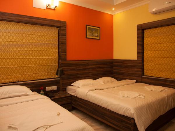 Om Sai Villa Guesthouse : photo 3 de la chambre chambre quadruple deluxe