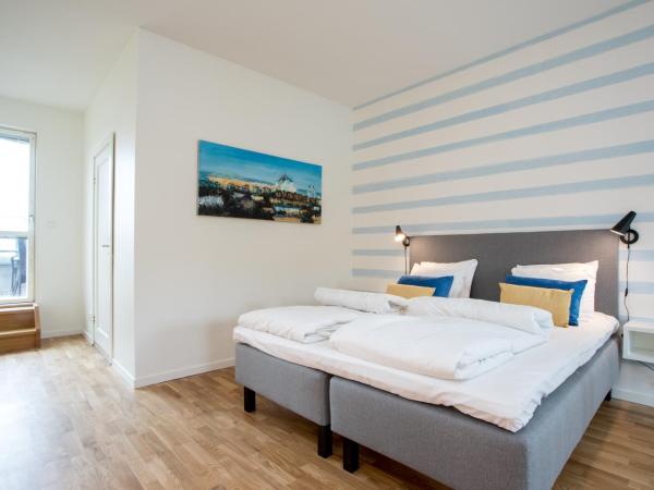 ApartDirect Hammarby Sjöstad : photo 7 de la chambre appartement en duplex avec terrasse