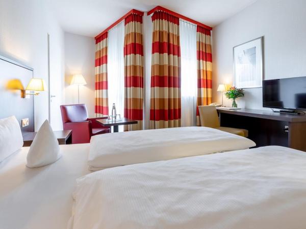 Trip Inn Frankfurt Nordwestzentrum : photo 3 de la chambre chambre lit king-size deluxe
