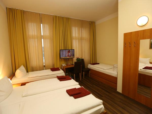Hotel AI Königshof : photo 4 de la chambre chambre quadruple
