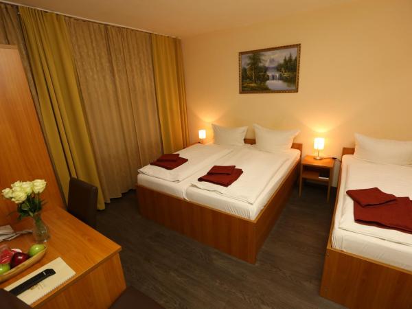 Hotel AI Königshof : photo 7 de la chambre chambre triple