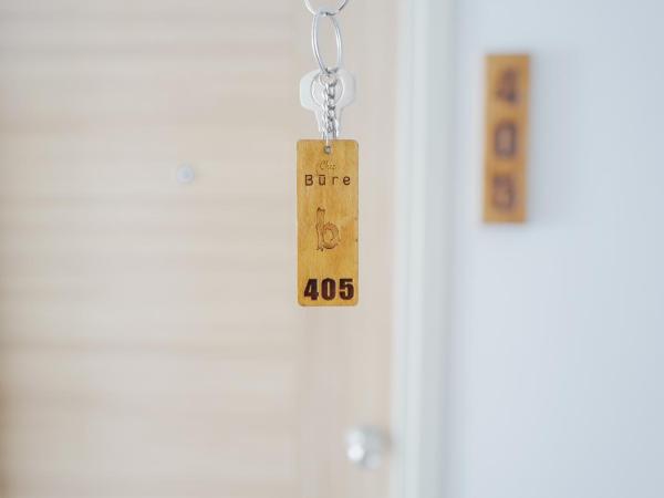 Chez Bure - Bure Homestay : photo 10 de la chambre chambre lit king-size - vue sur jardin