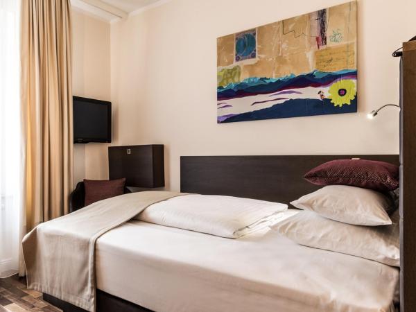 Hotel Sandwirth : photo 5 de la chambre chambre lit queen-size