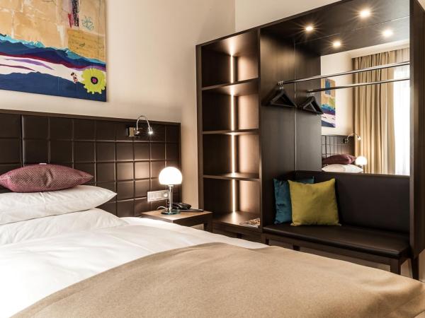 Hotel Sandwirth : photo 2 de la chambre chambre lit queen-size