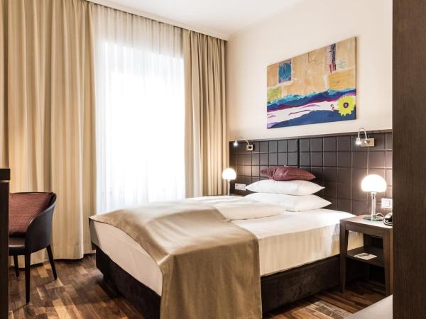 Hotel Sandwirth : photo 1 de la chambre chambre lit queen-size