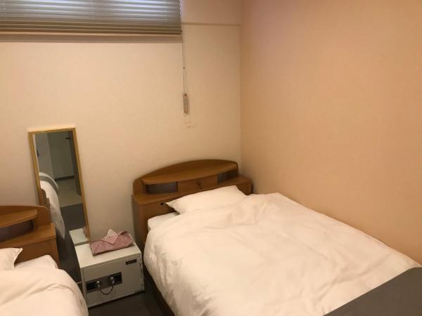 Guest House Rice Chikko : photo 1 de la chambre small twin room with shared bathroom 303