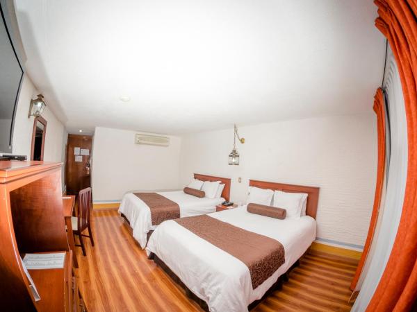Howard Johnson by Wyndham Morelia Calle Real : photo 1 de la chambre chambre double exécutive avec 2 lits doubles - non-fumeurs