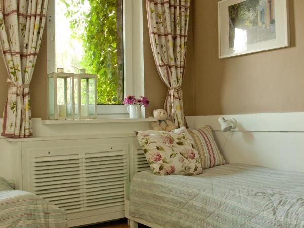 Hotel Flora : photo 6 de la chambre chambre triple