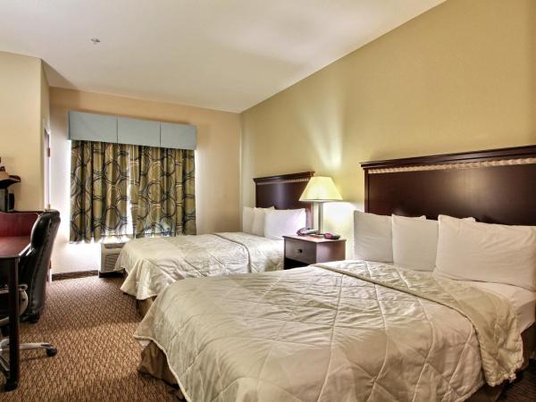 Magnolia Inn and Suites Pooler : photo 1 de la chambre chambre double avec 2 lits doubles - non-fumeurs