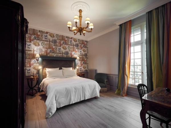 Castel Bois Marie, Maison d'hôtes : photo 4 de la chambre chambre double confort - vue sur jardin