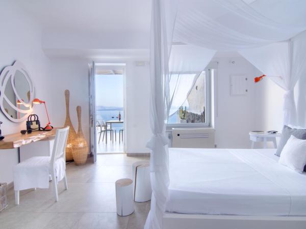 Santorini Secret Suites & Spa, Small Luxury Hotels of the World : photo 5 de la chambre suite infini avec piscine privée - vue sur caldeira