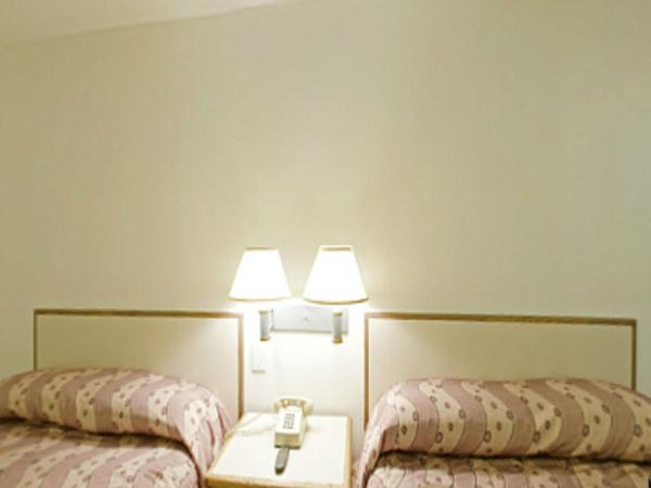 Royal Inn : photo 4 de la chambre chambre double avec 2 lits doubles