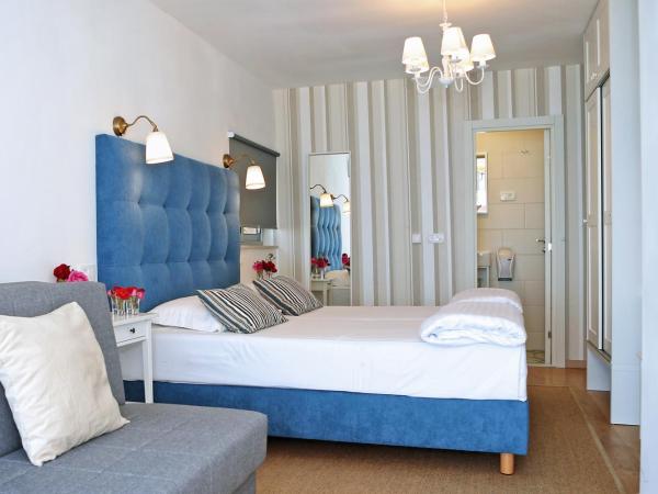 Hotel Delfin : photo 1 de la chambre chambre double ou lits jumeaux supérieure avec balcon - vue sur mer