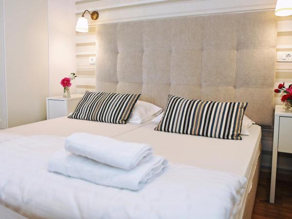 Hotel Delfin : photo 6 de la chambre chambre double ou lits jumeaux supérieure avec balcon - vue sur mer