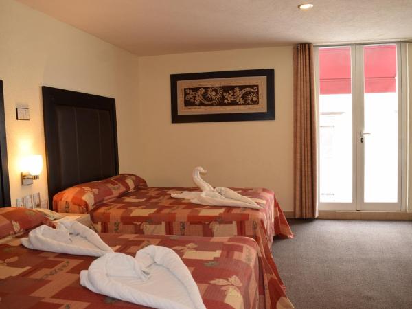 Hotel Posada Guadalupe : photo 5 de la chambre chambre lits jumeaux